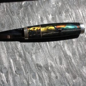 Puukko: valmistettu Ylämaan Spktroliitista helat Hopeaa